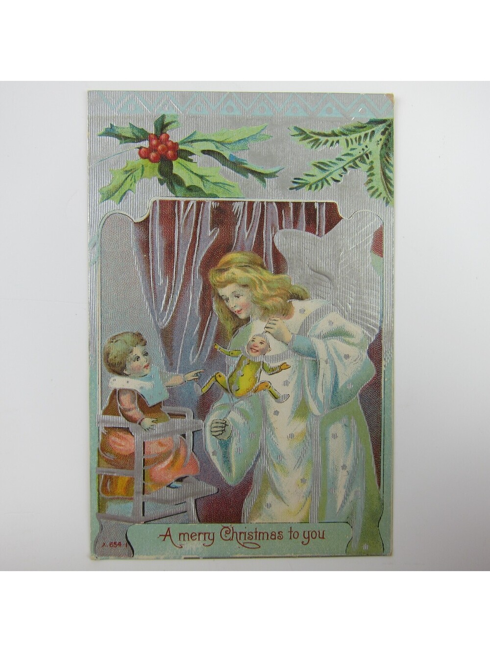Christmas Postcard Angel Gives Jumping Jack Toy to Child Silver Embossed Antique